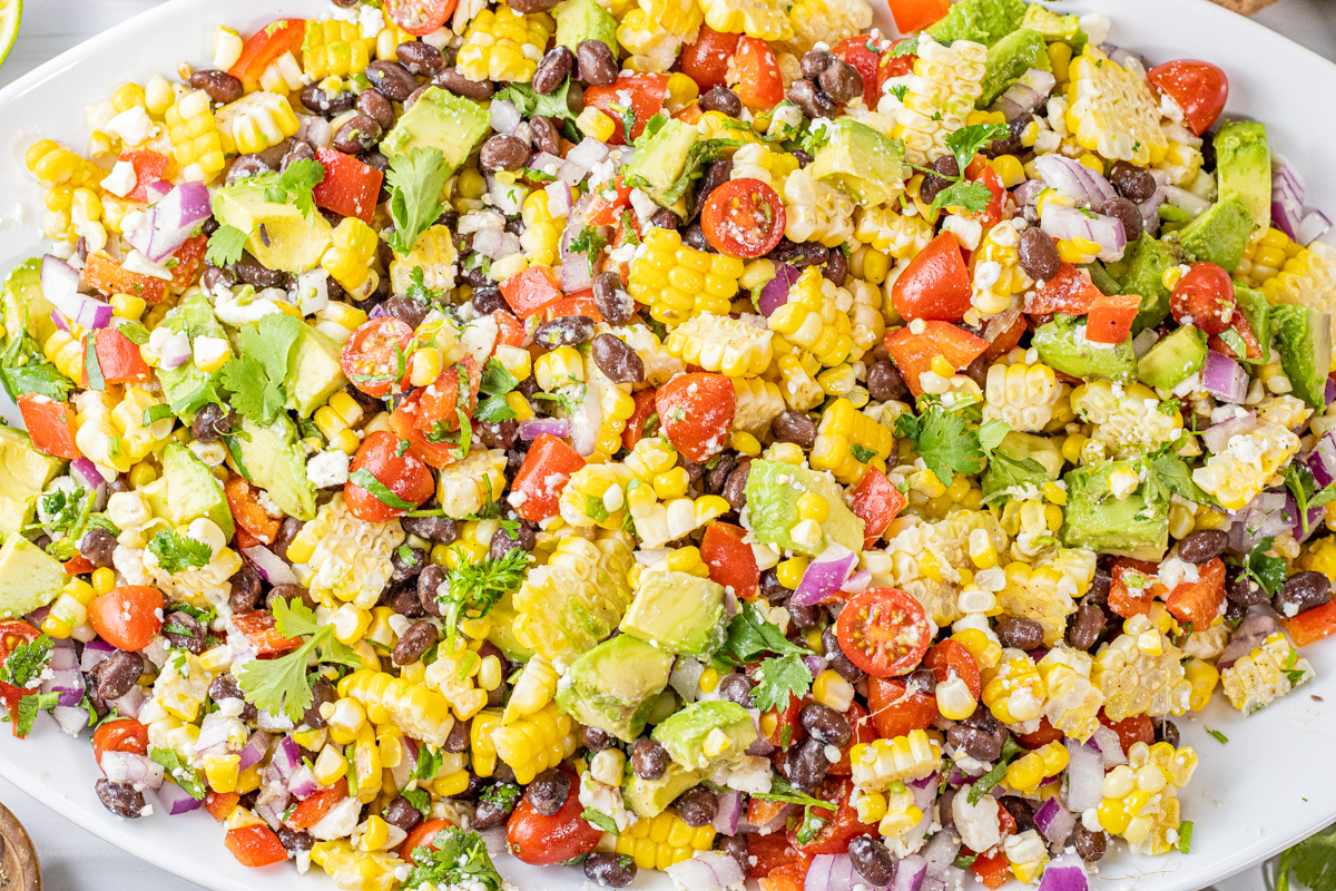 close up of corn, tomato salad