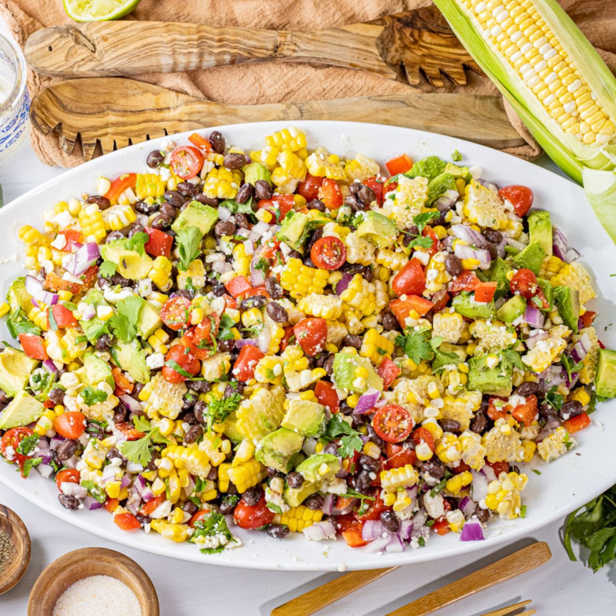 corn salad on a white platter