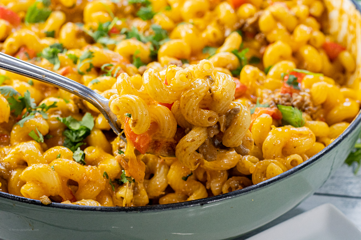 taco pasta with cheese in a large skillet