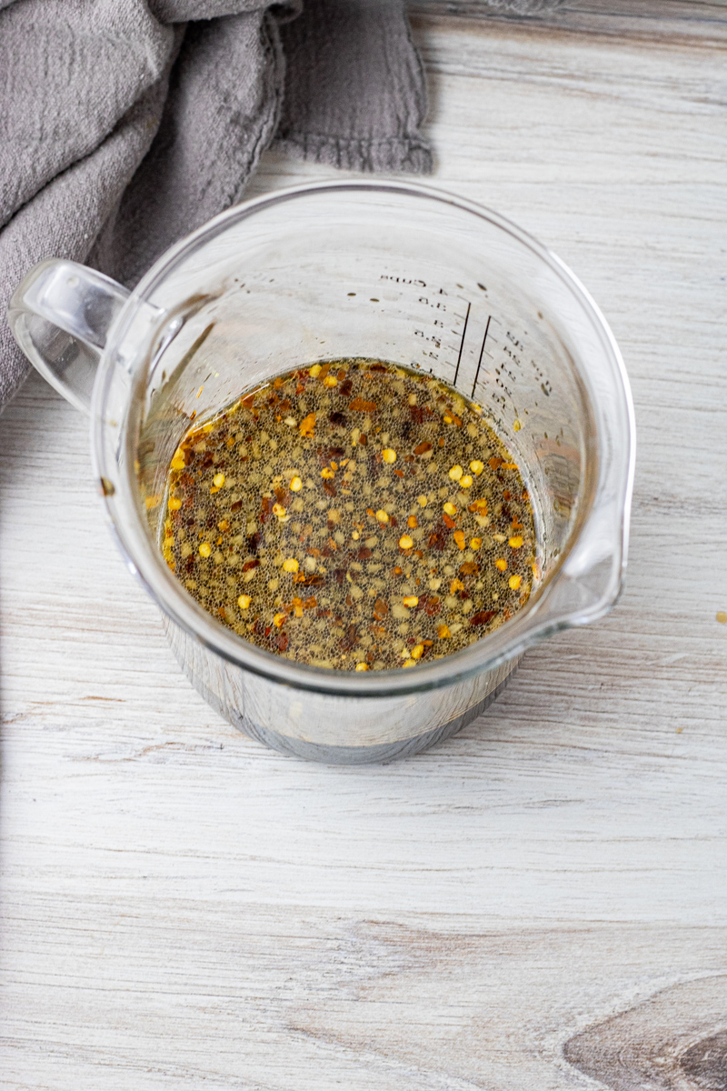 sauce mixed in a glass measuring jar