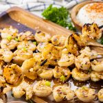 shrimp grilled on wooden skewers