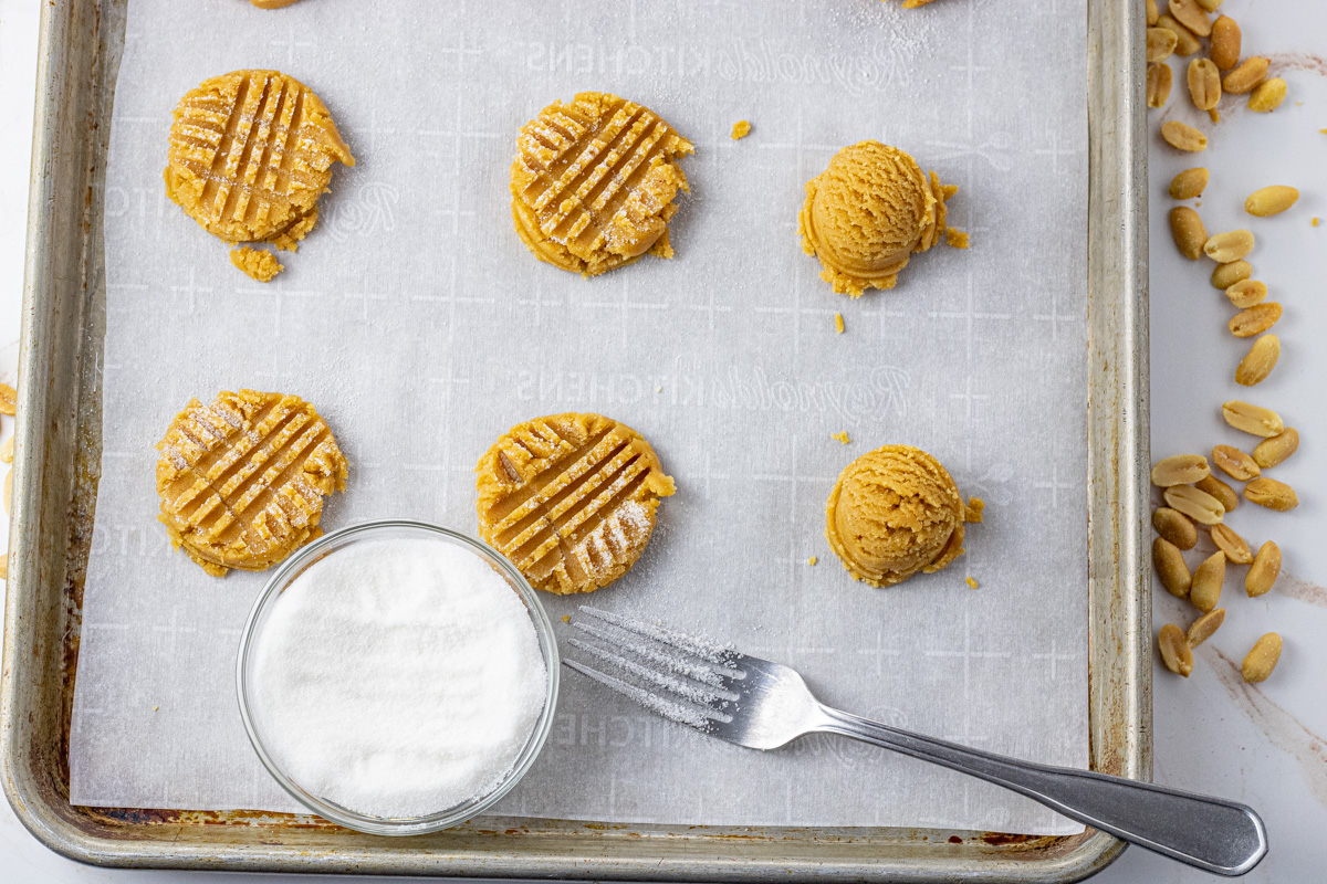 peanut butter cookie dough on a baking sheet