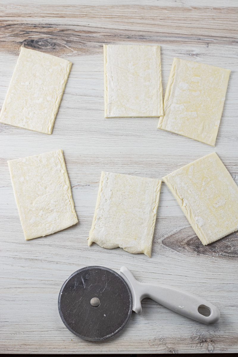 pieces of uncooked puff pastry cut into rectangles