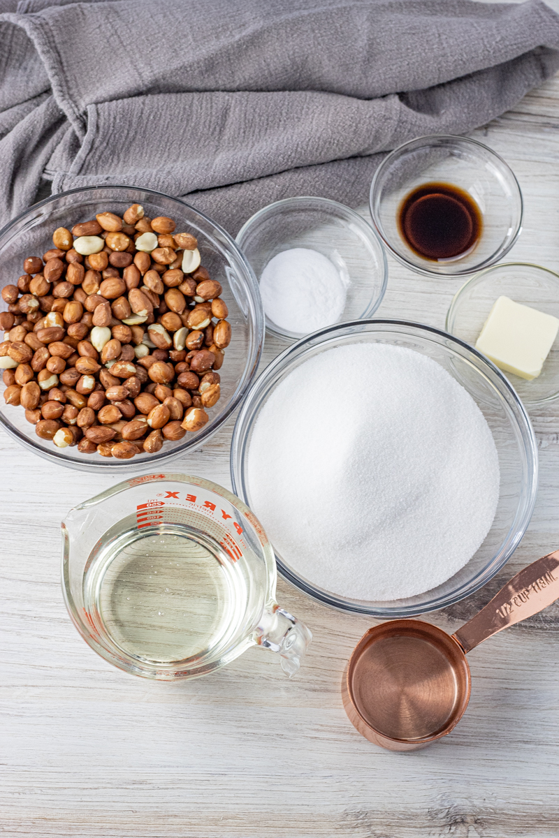 sugar, peanuts, vanilla, corn syrup, butter in small glass bowls