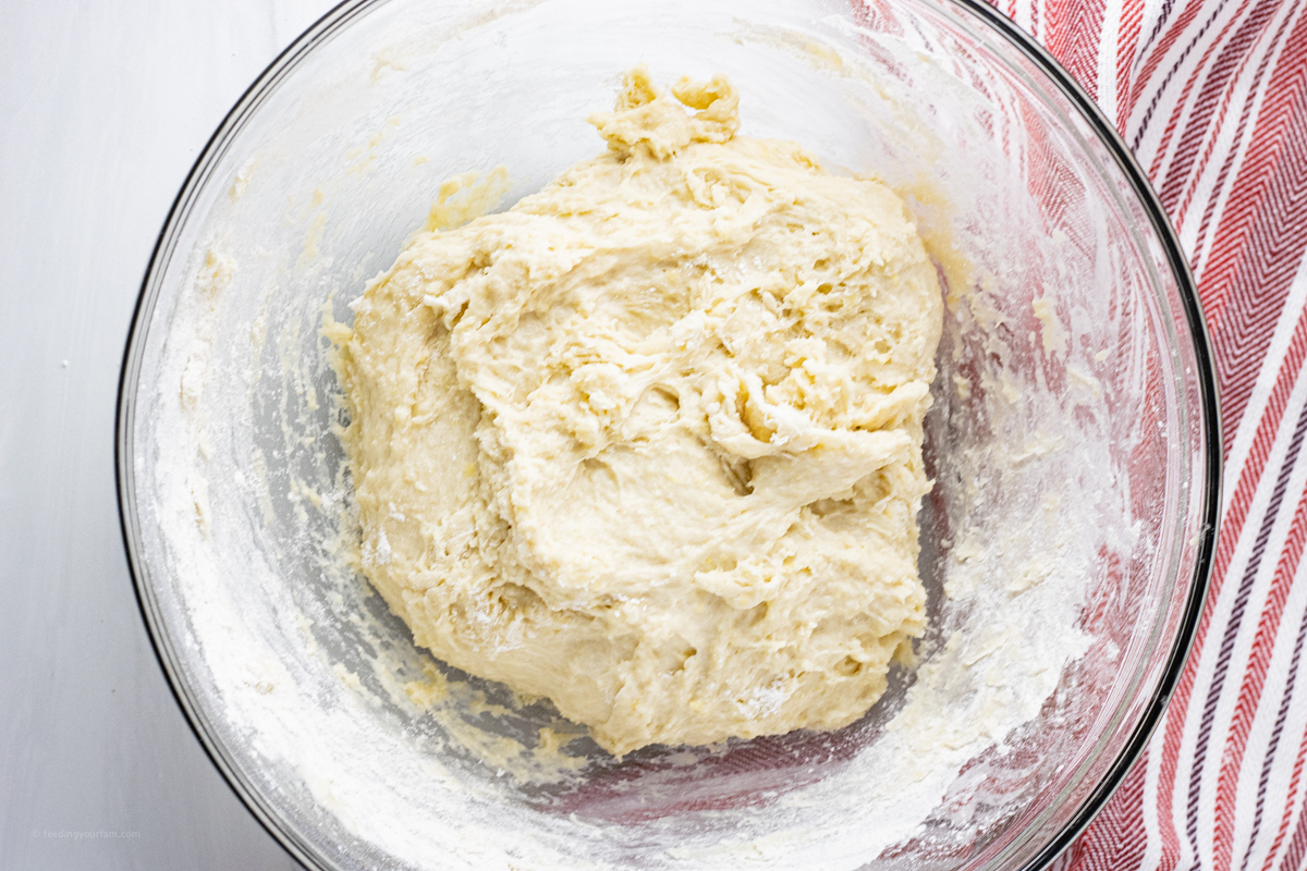 bread dough in a glass bowl