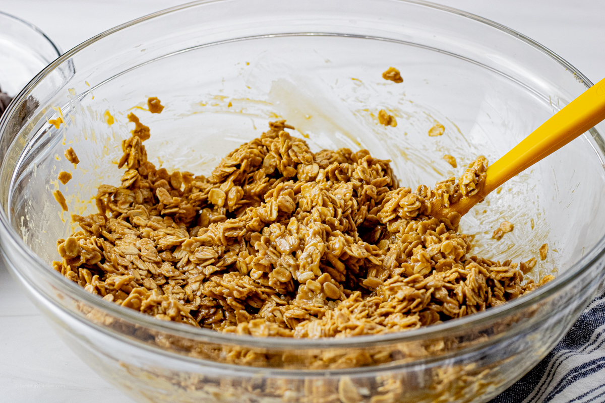 bowl of oatmeal covered in peanut butter mixture
