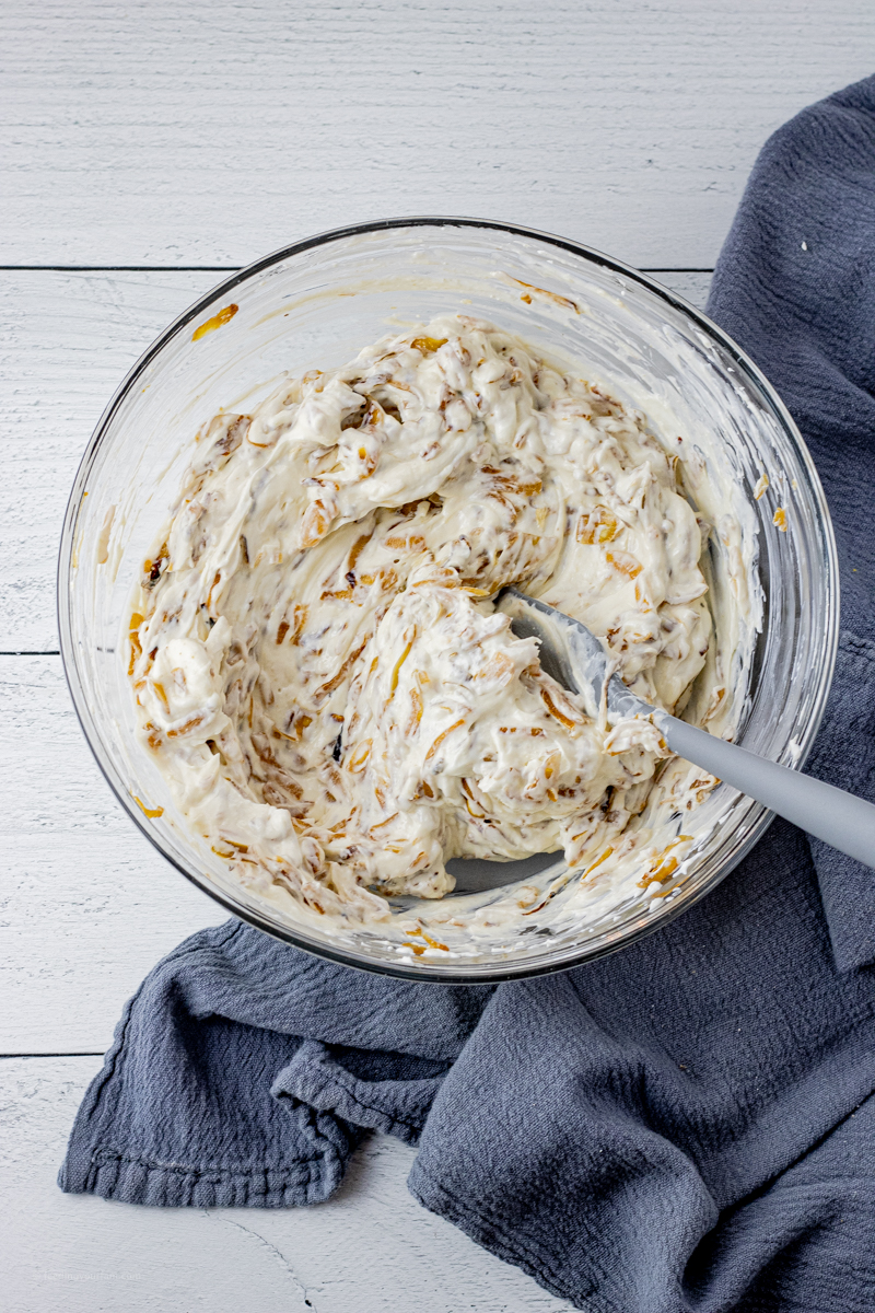 cream cheese dip mixed with caramelized onions