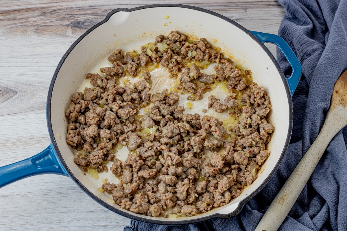 browned sausage in a large skillet