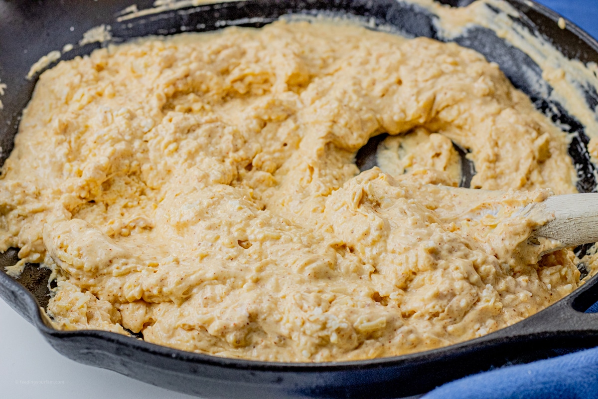 cheesy dip in a cast iron pan