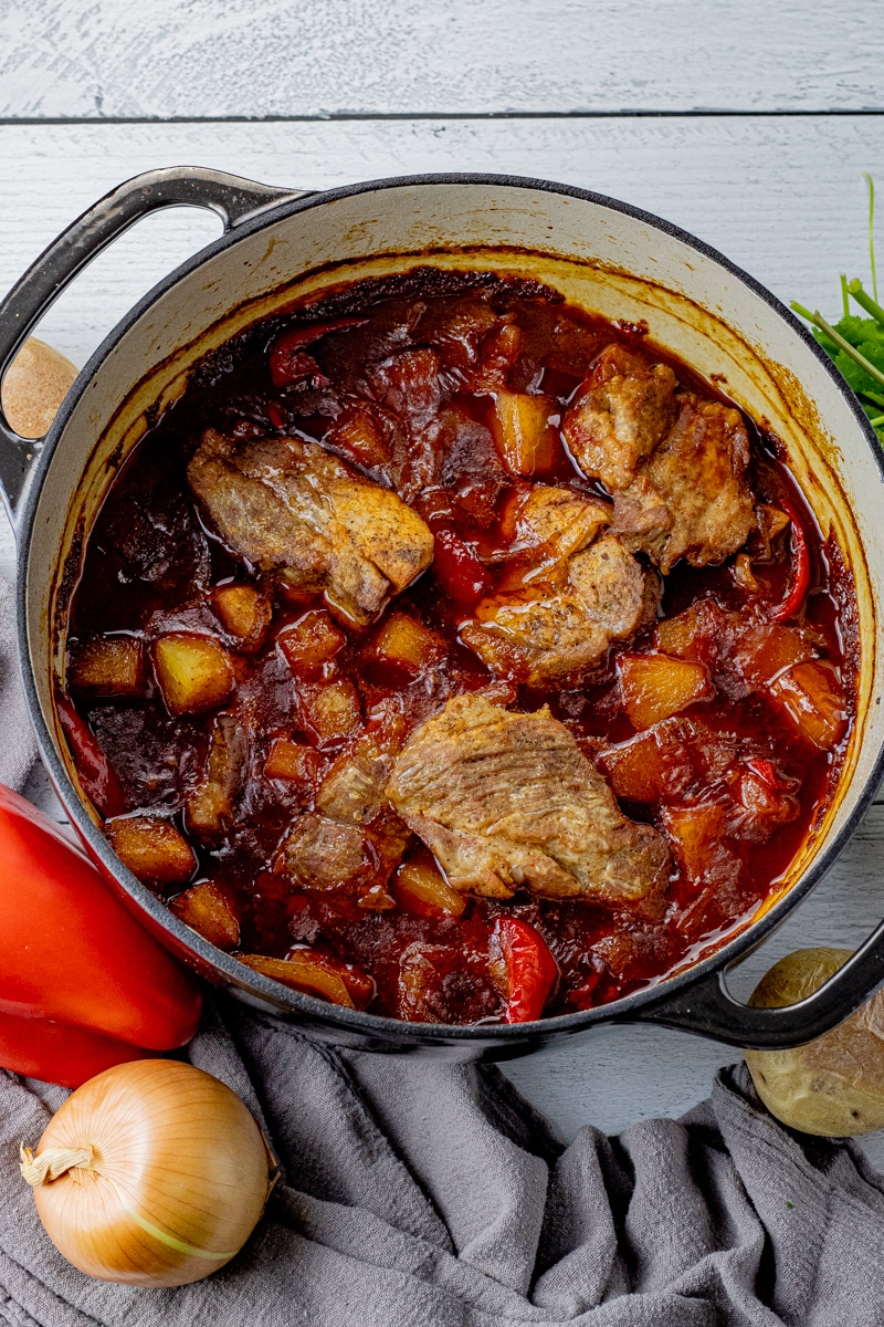 cooked pork ribs with pineapple and peppers