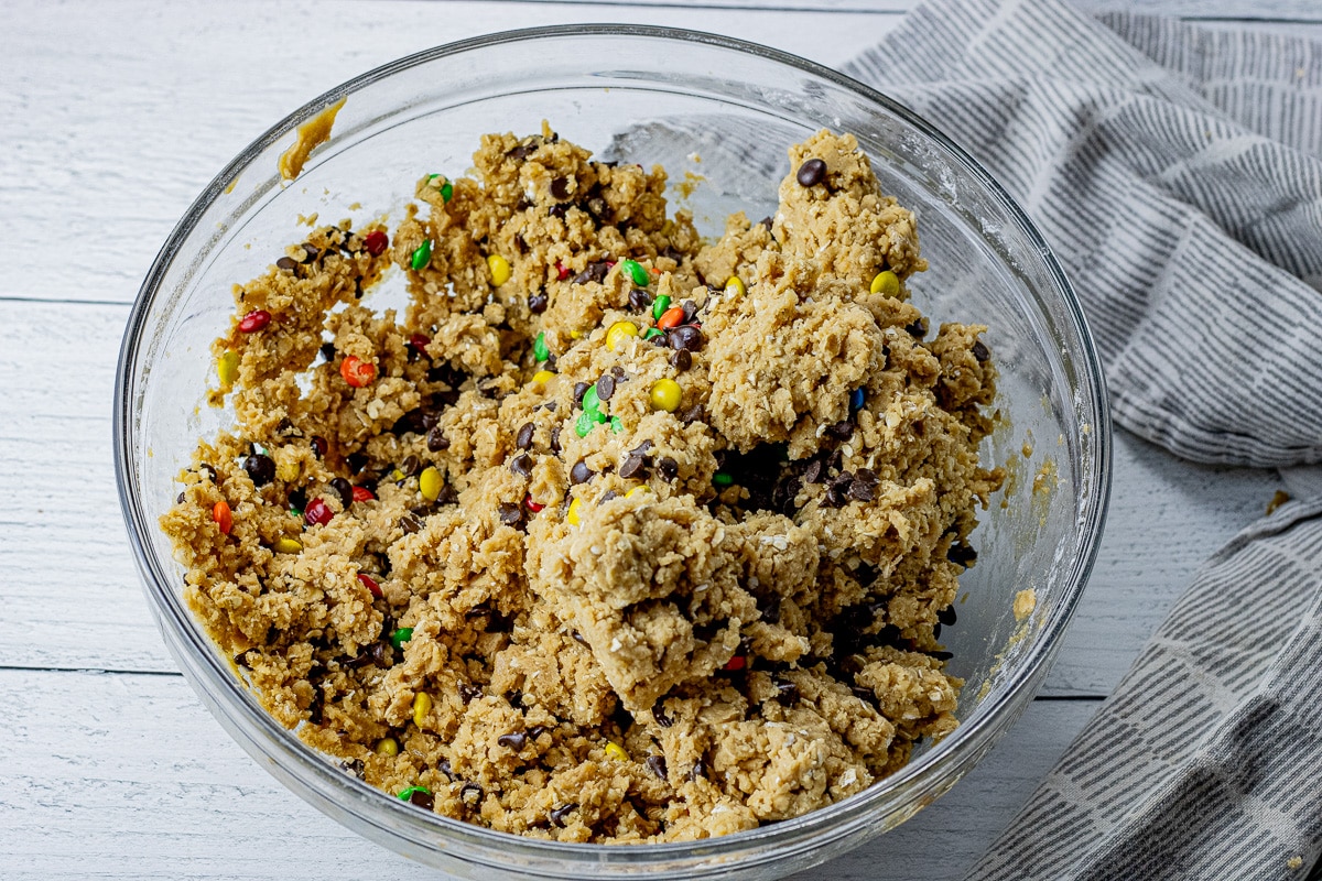 uncooked cookie dough in a large glass bowl