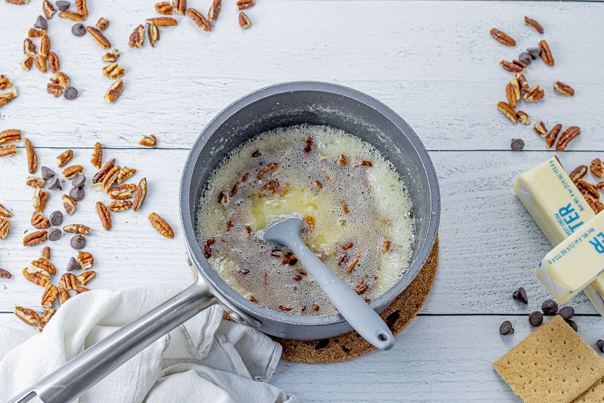 small sauce pan of butter sugar and pecans