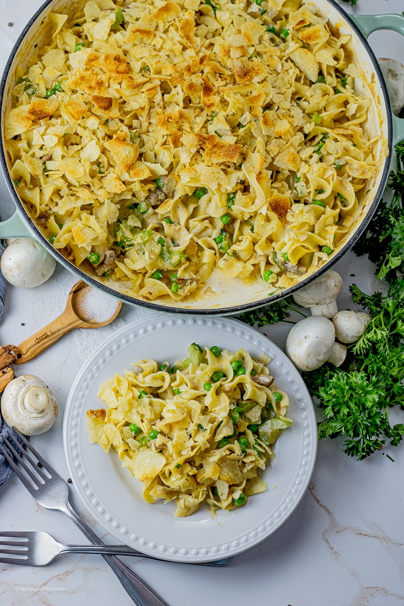 big pot of tuna noodle casserole topped with crushed potato chips