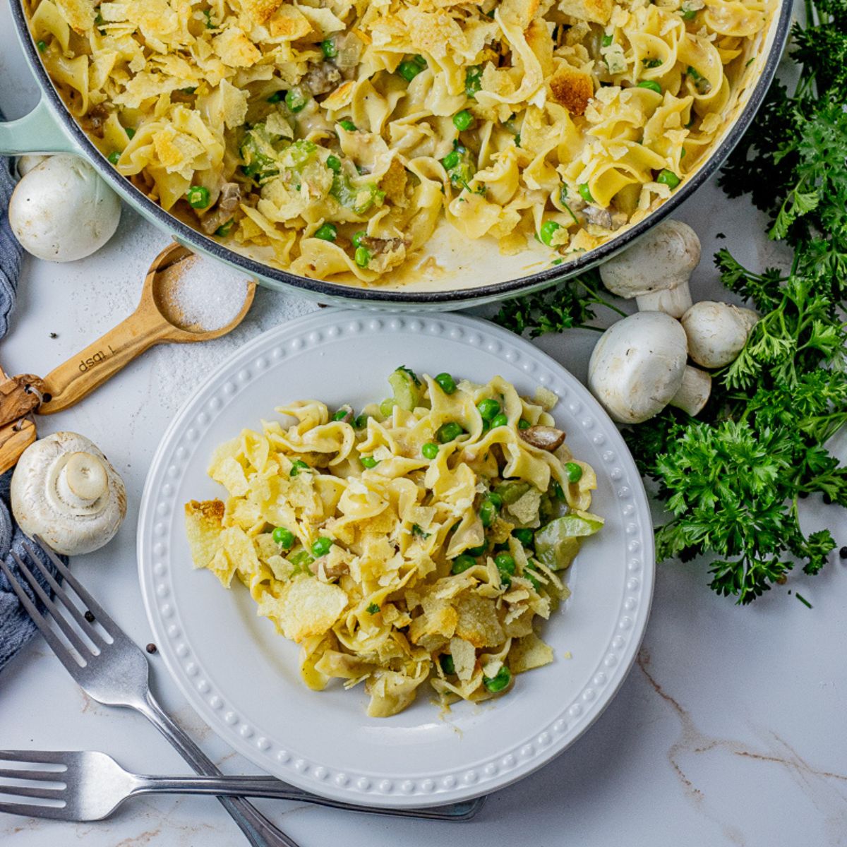 white plate with a scoop of tuna casserole