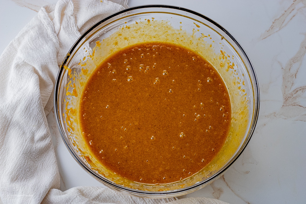 pumpkin puree mixed with sugar and eggs to make the beginning of pumpkin bar recipe