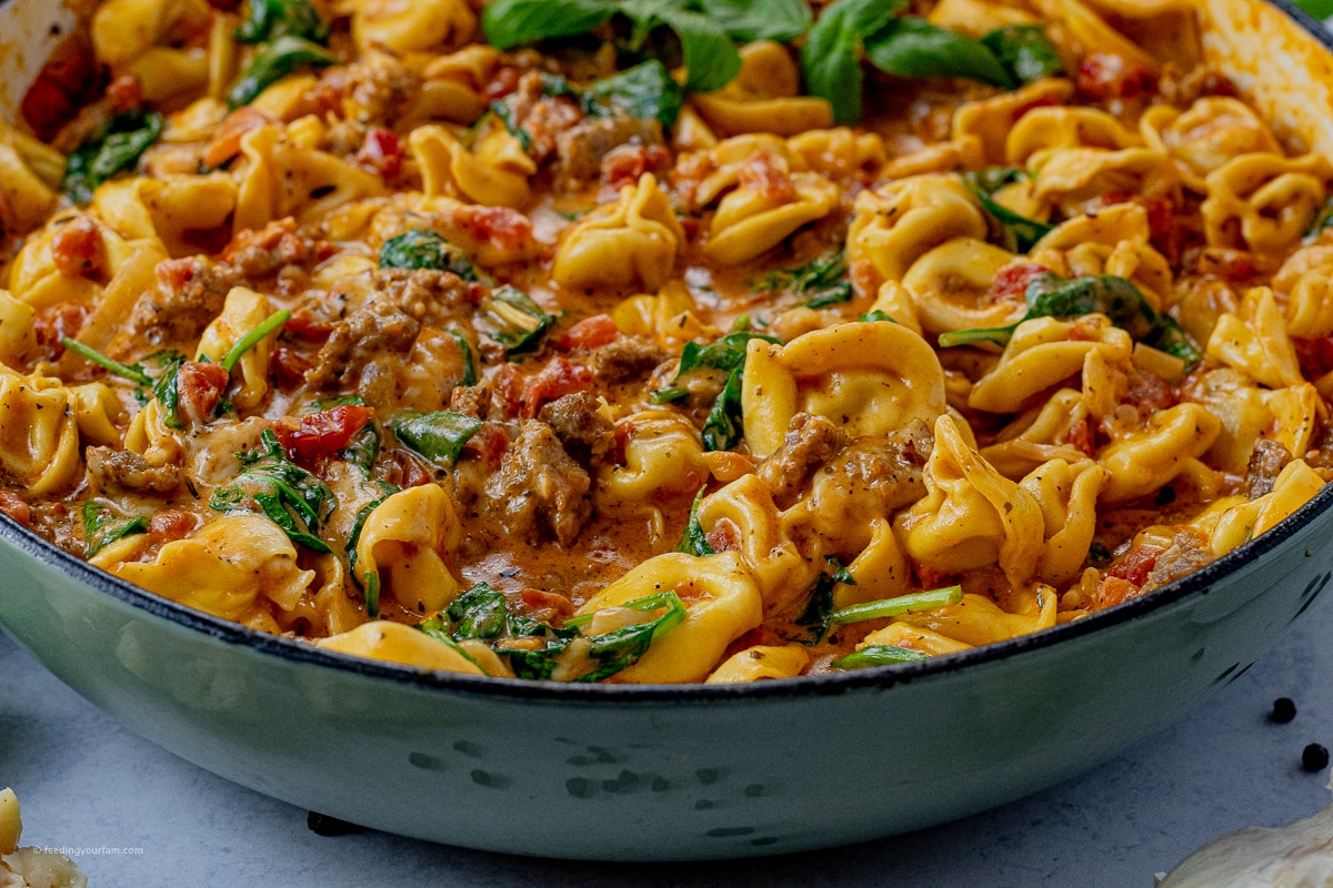 tortellini and sausage in a creamy sauce
