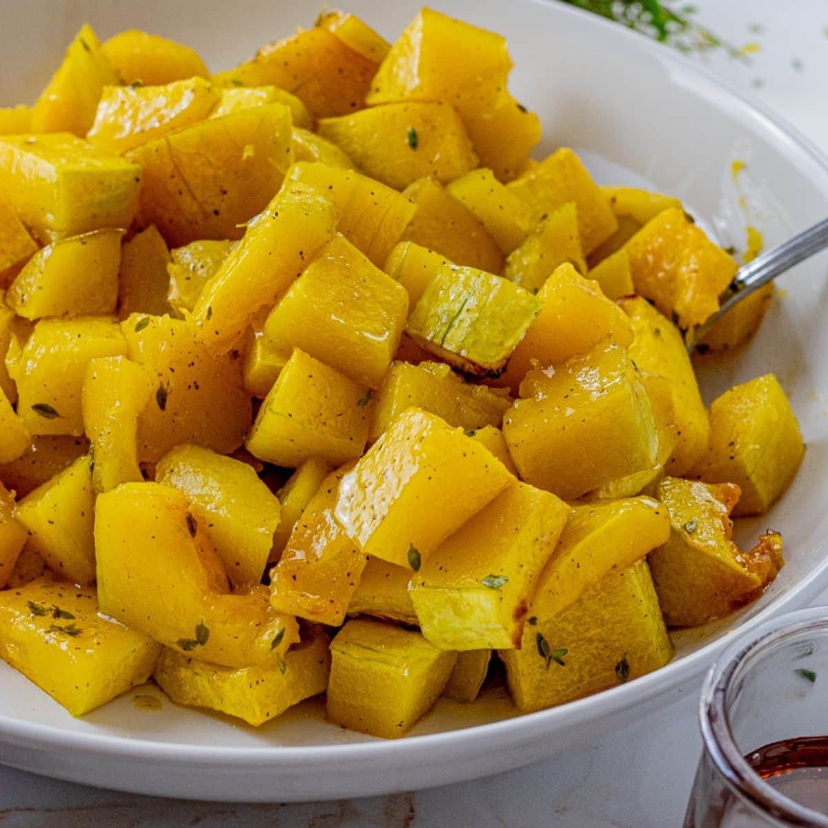 cubes of baked butternut squash that have been roasted in the oven