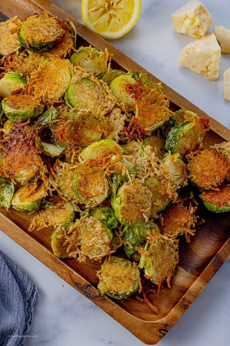 brussel sprouts sliced in half and cooked in parmesan cheese