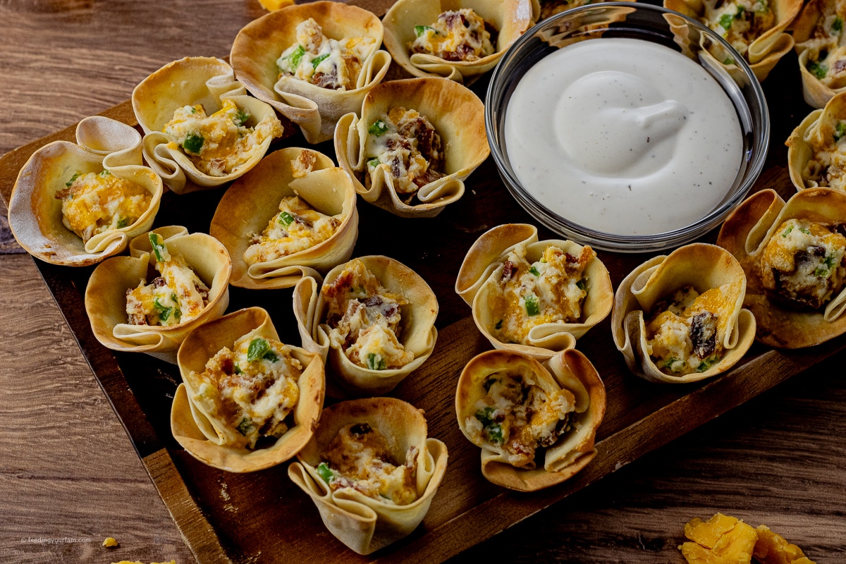 gyoza wrappers filled with jalapeno popper filling and backed until browned