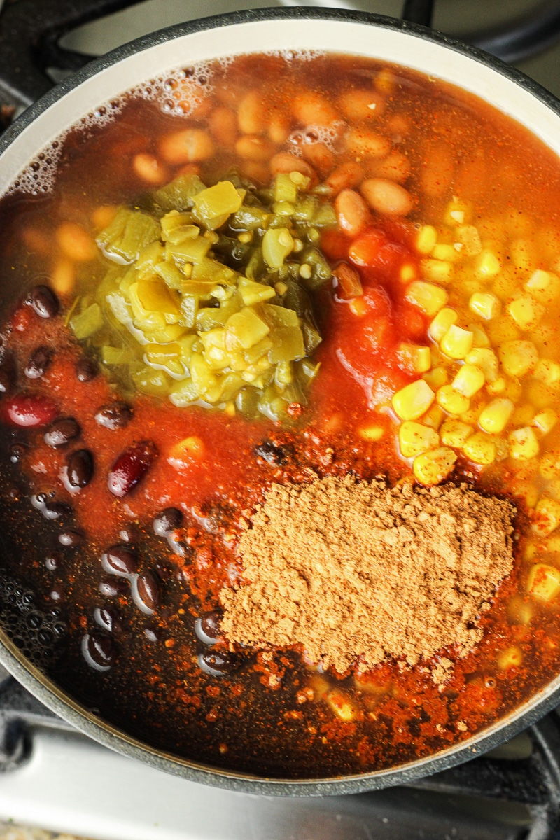beans, corn, green chiles and taco seasoning in a pot to make 8 can taco soup recipe