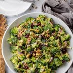 broccoli salad recipe in a white bowl