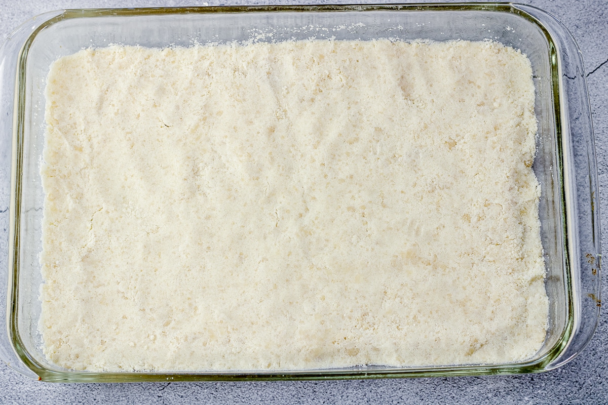 shortbread crust pressed into the bottom of a glass 9 x 13 inch pan