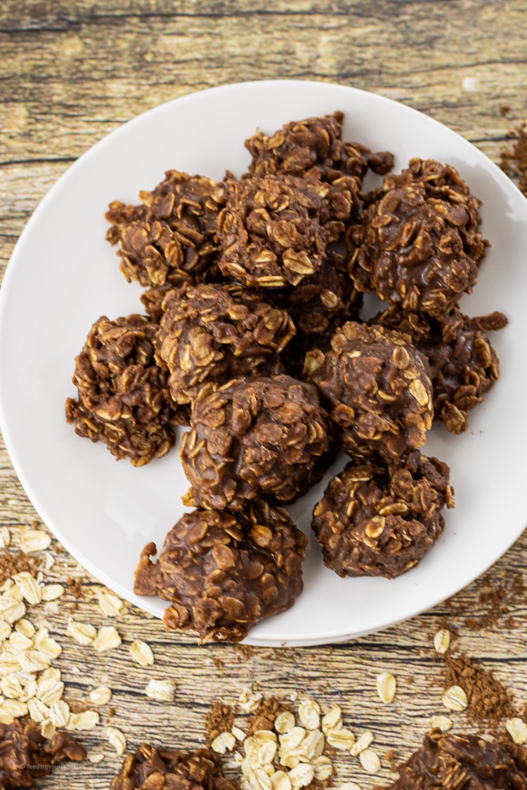 chocolate cookies made with oatmeal and peanut butter on a white plate