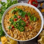 queso dip in a large white bowl
