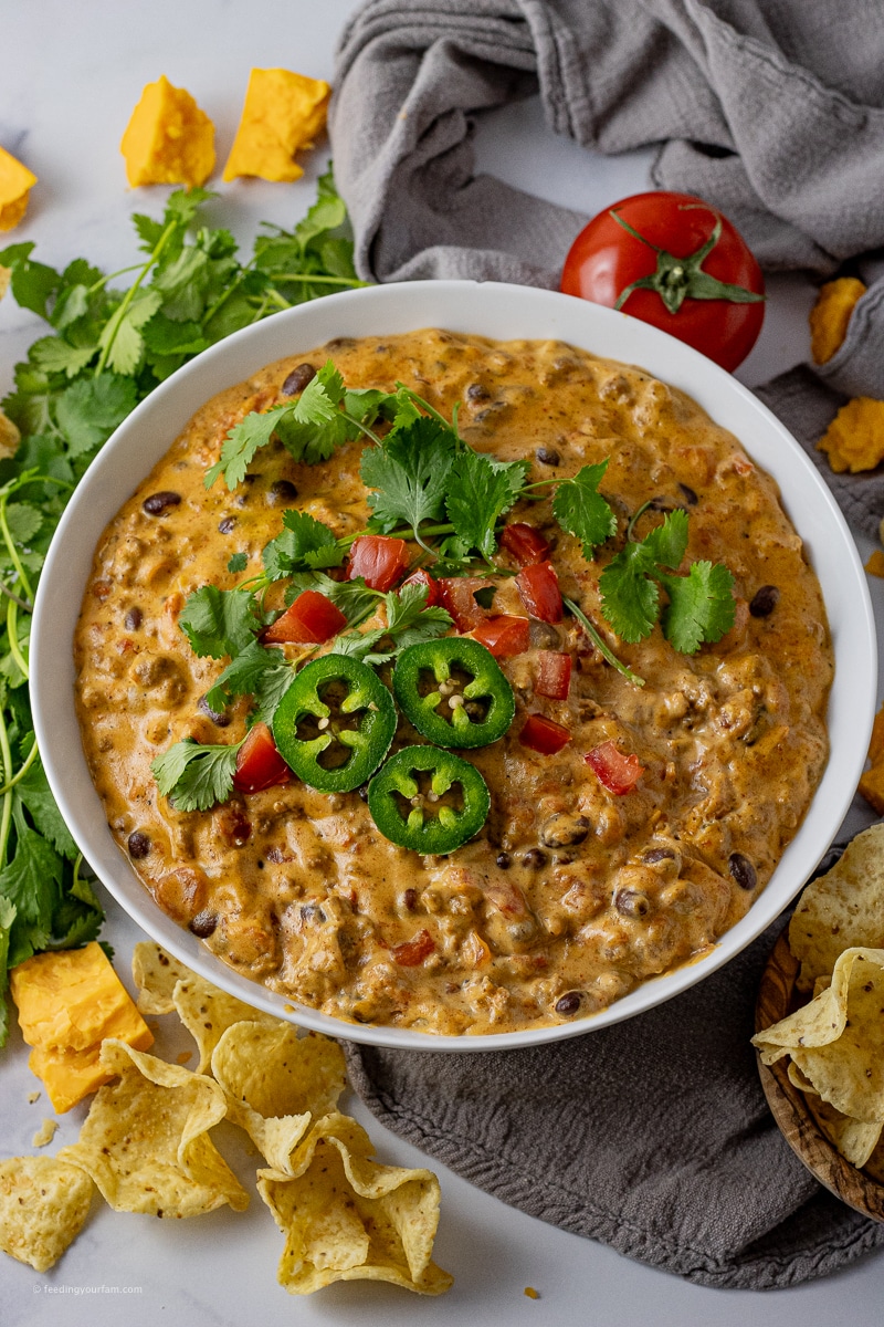 big bowl of queso with ground beef and black beans