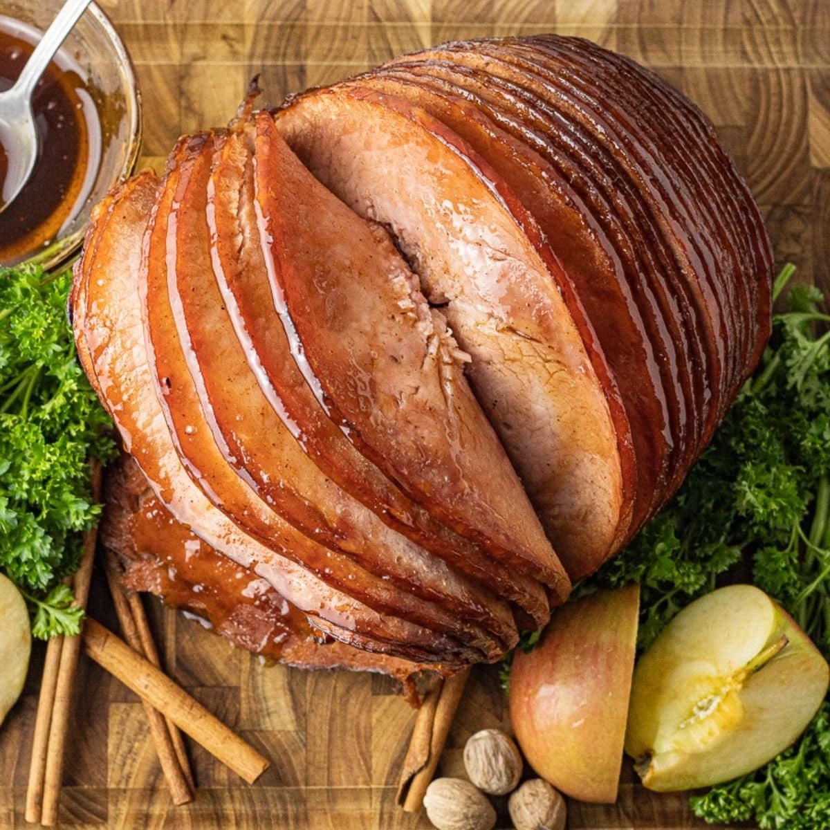 sliced ham on a wooden cutting board