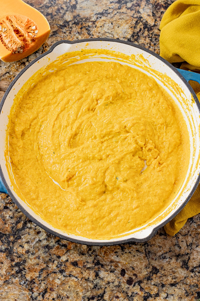 blended up butternut squash in a large skillet