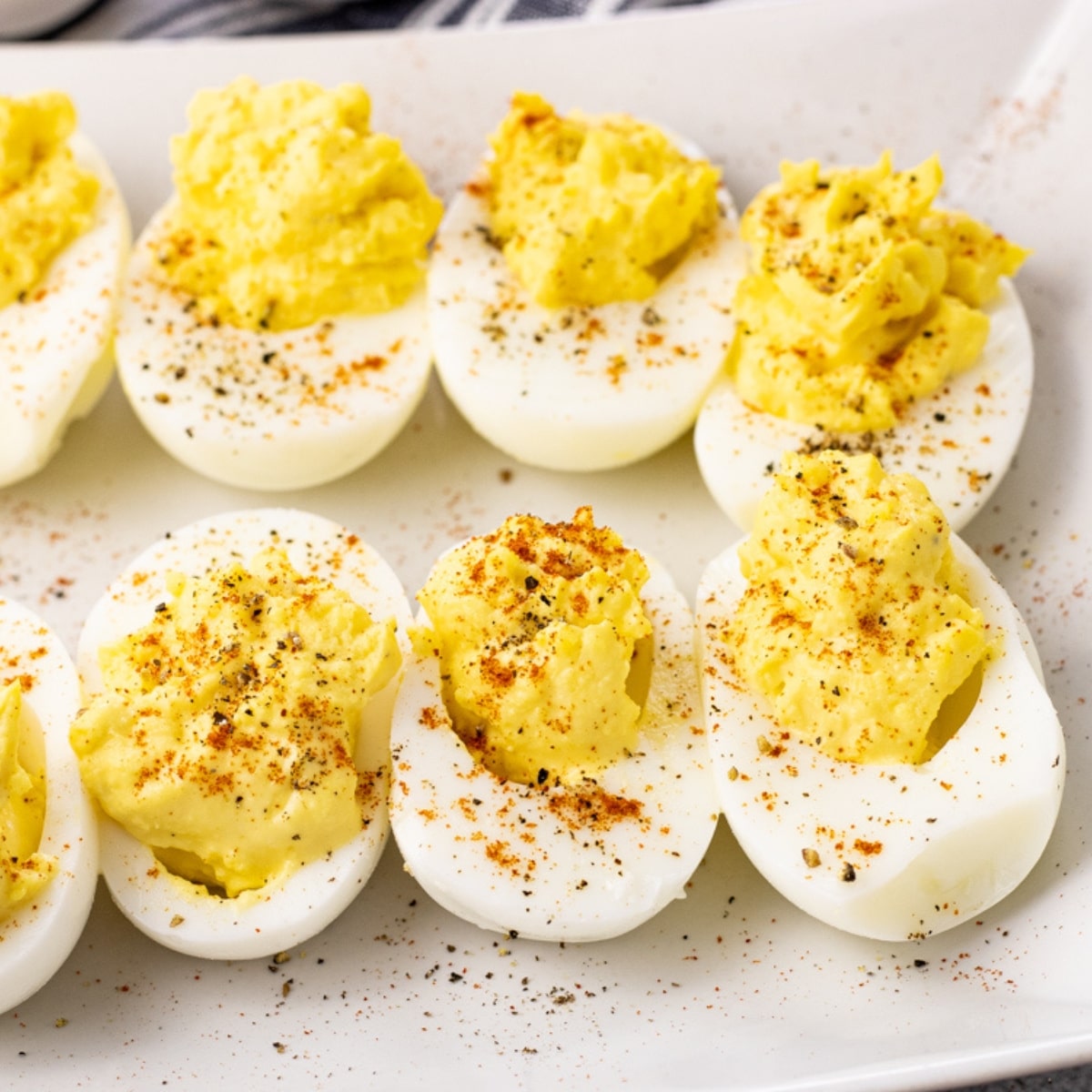 deviled eggs on a white plate