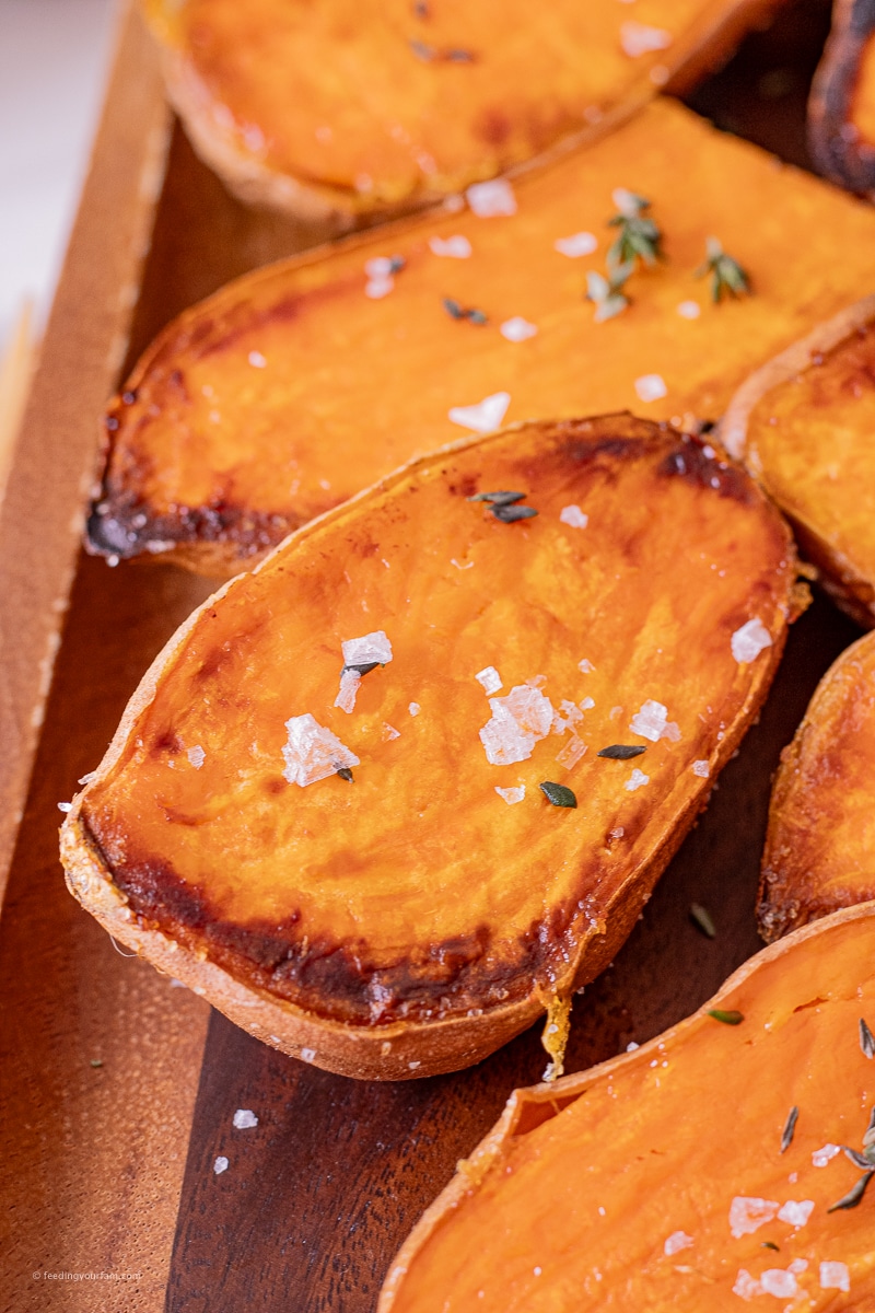 half of a sweet potatoes that has been baked