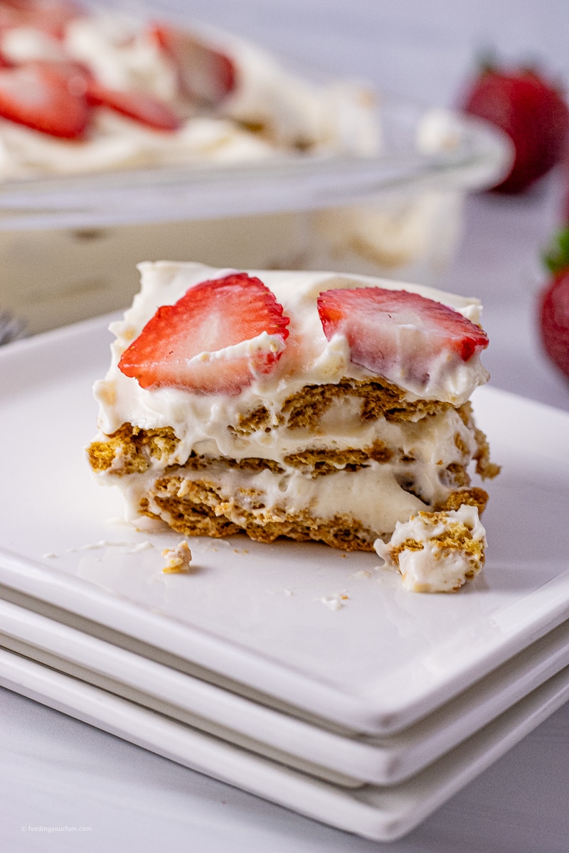 layered graham cracker cake with pudding and strawberries