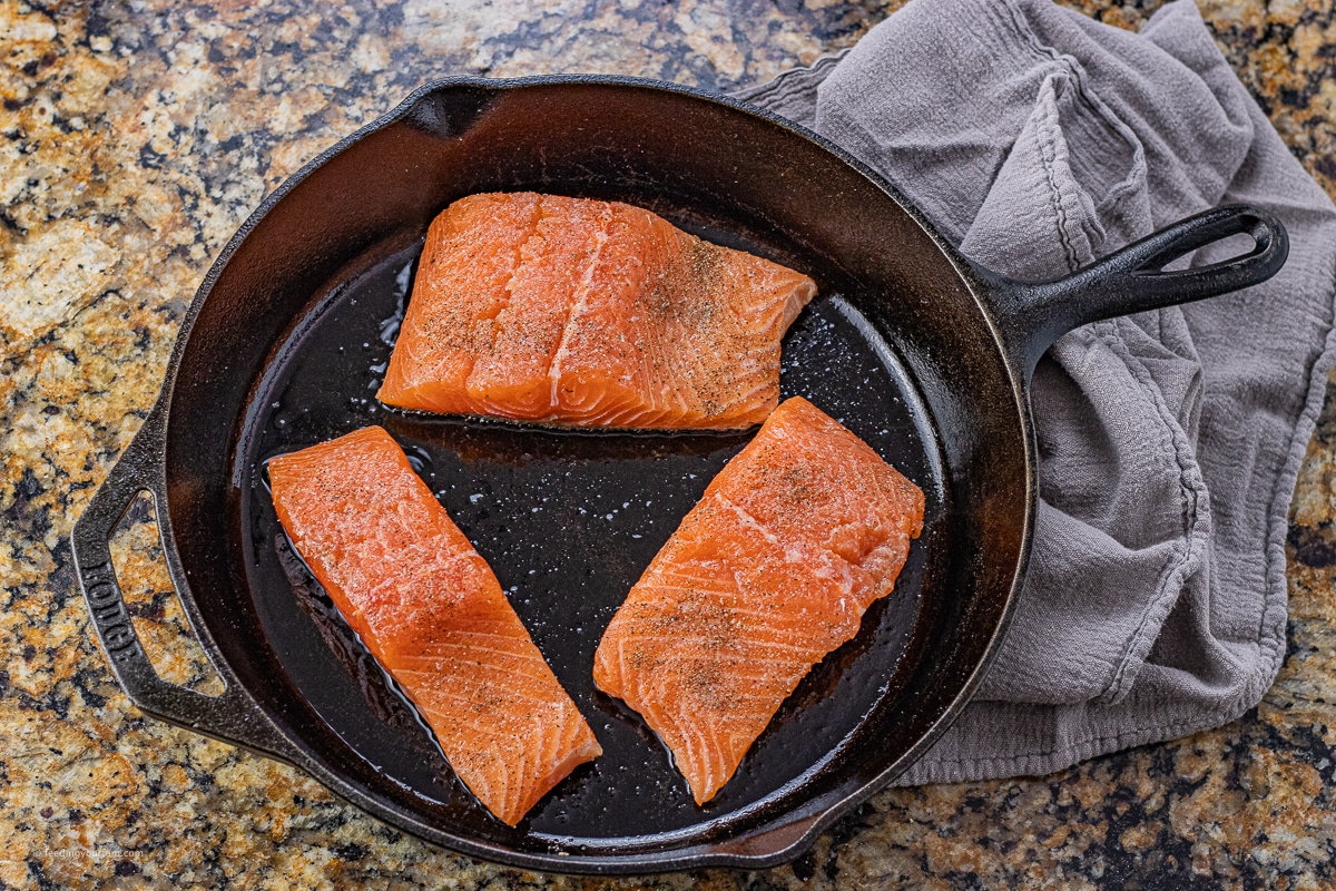 cooking salmon in a cast iron skillet