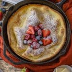 puffy dutch baby pancake in a cast iron skillet