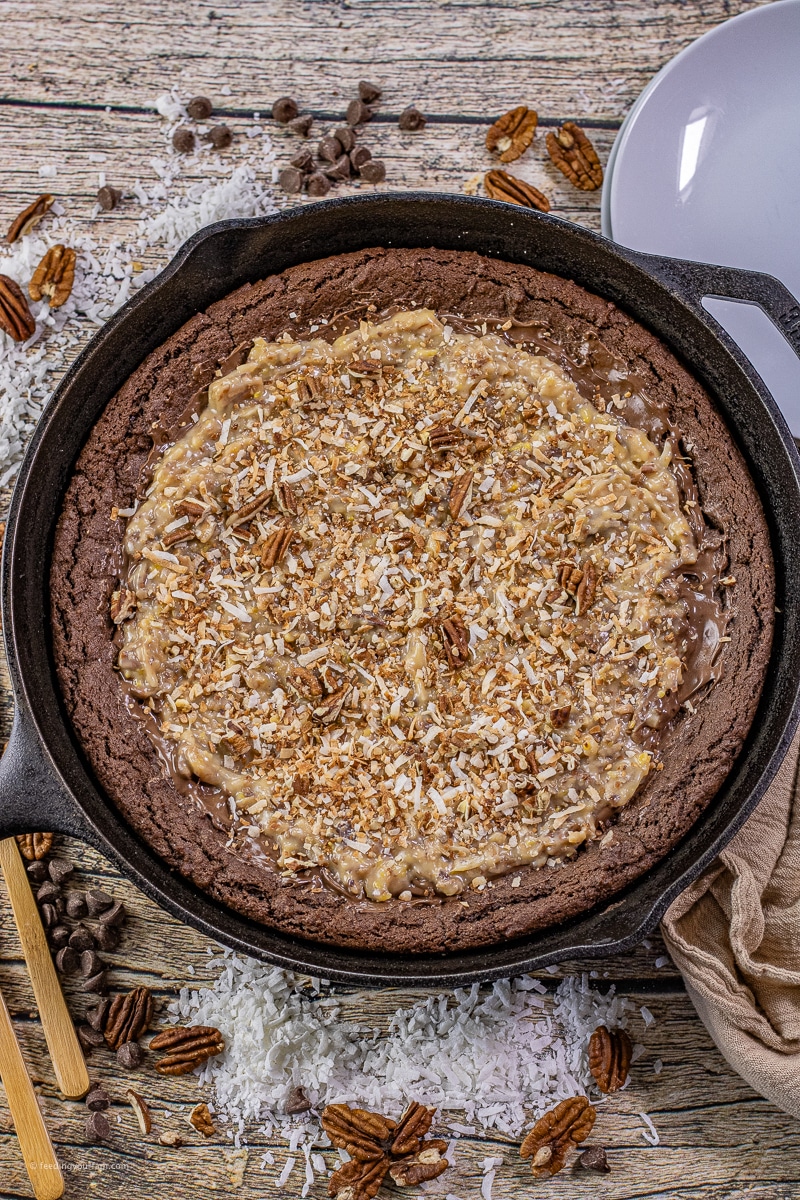 cast iron skillet with a german chocolate cookie baked in it