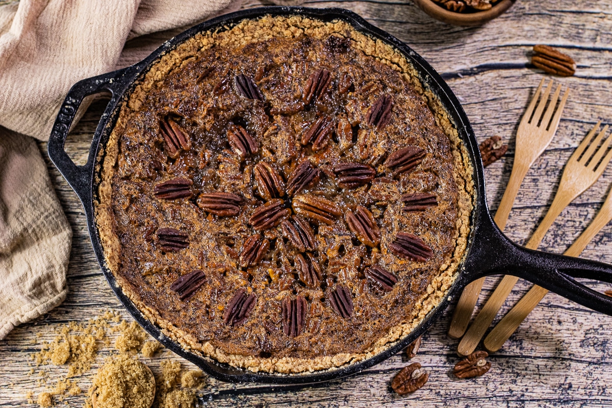 pecan pie baked in a cast iron skillet