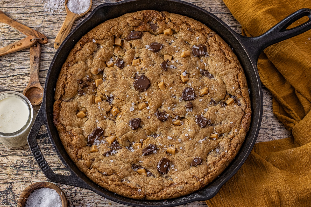 salted caramel skillet cookie in a cast iron skillet
