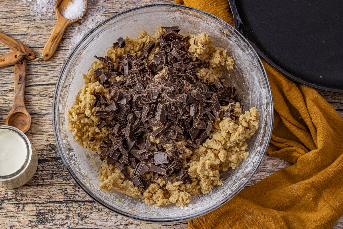 cookie dough topped with chopped chocolate