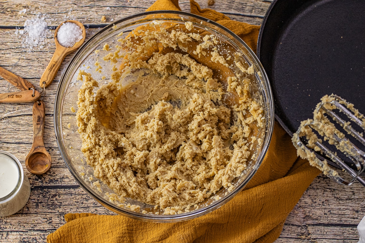 butter and sugar mixed in a mixing bowl