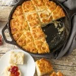 butter swim buttermilk biscuits in a cast iron skillet
