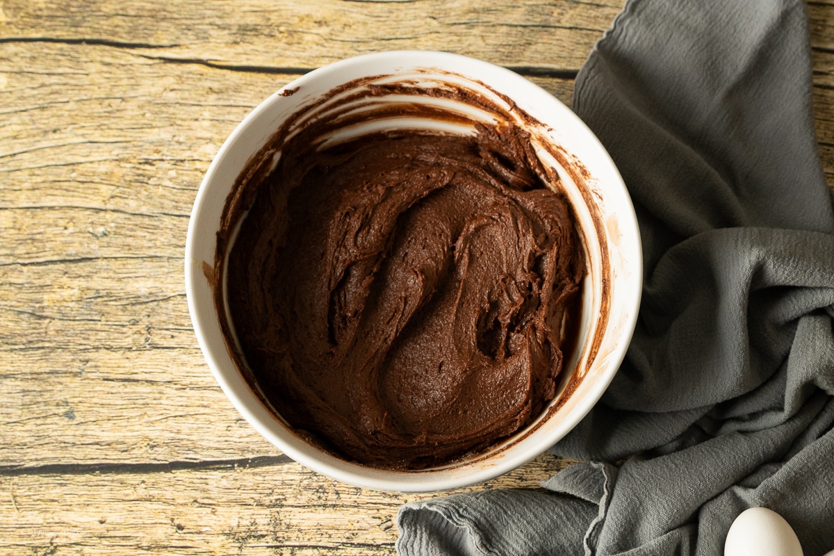 brownie batter in a white bowl