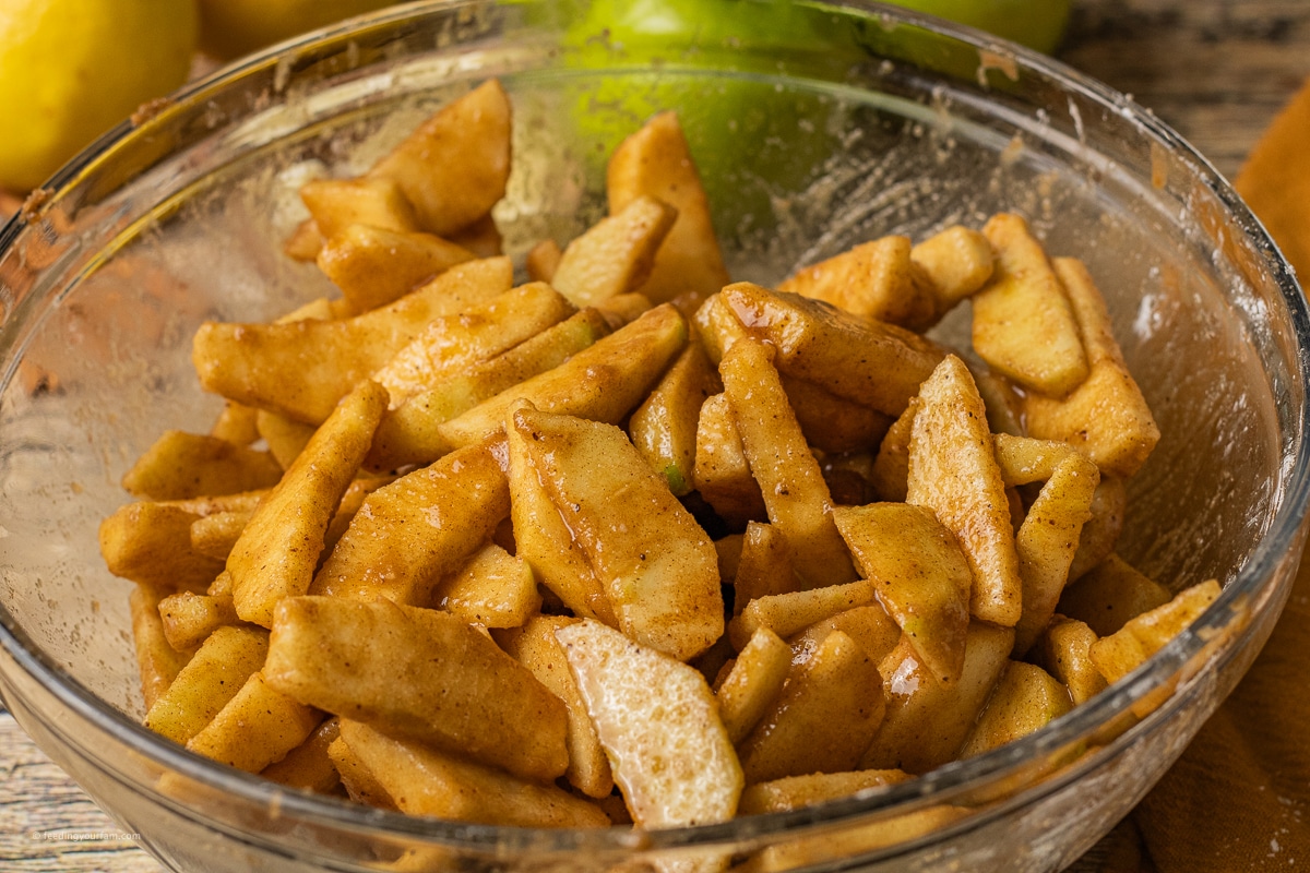apple pie filling in a large mixing bowl