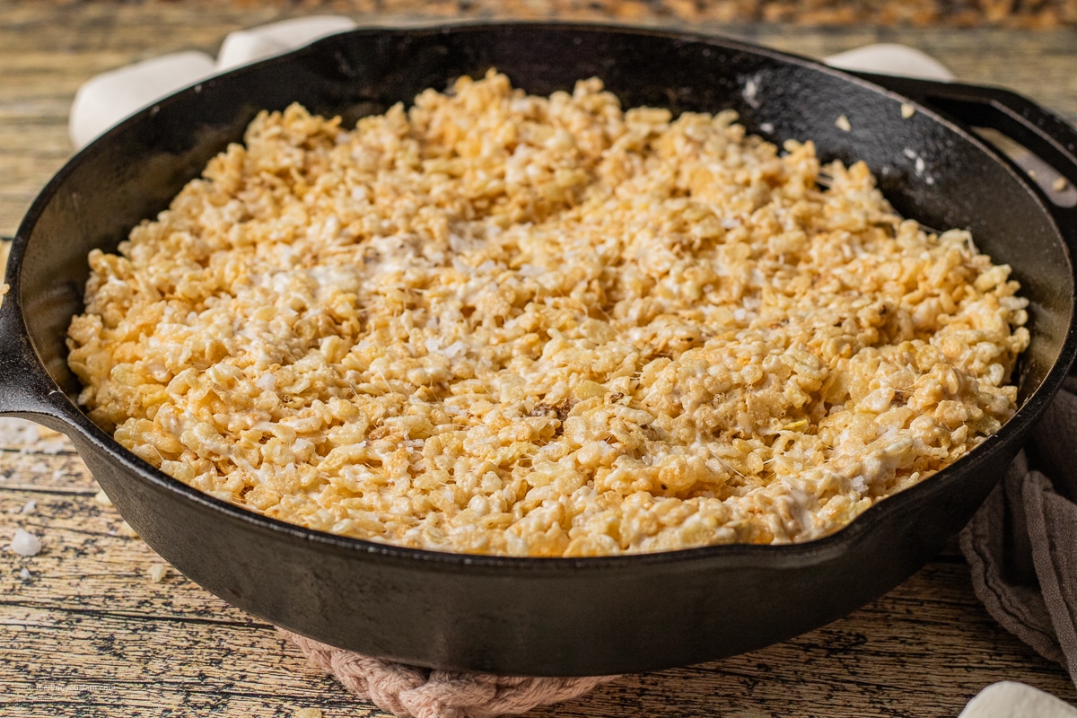 toasted marshmallow rice krispie treats in a cast iron skillet