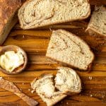 cinnamon swirl bread baked in a dutch oven with butter