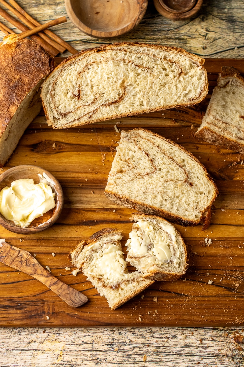 cinnamon swirl bread baked in a dutch oven with butter