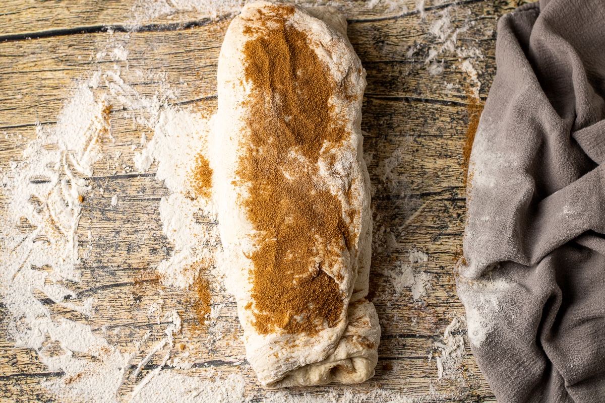 folded cinnamon bread with cinnamon sugar on top