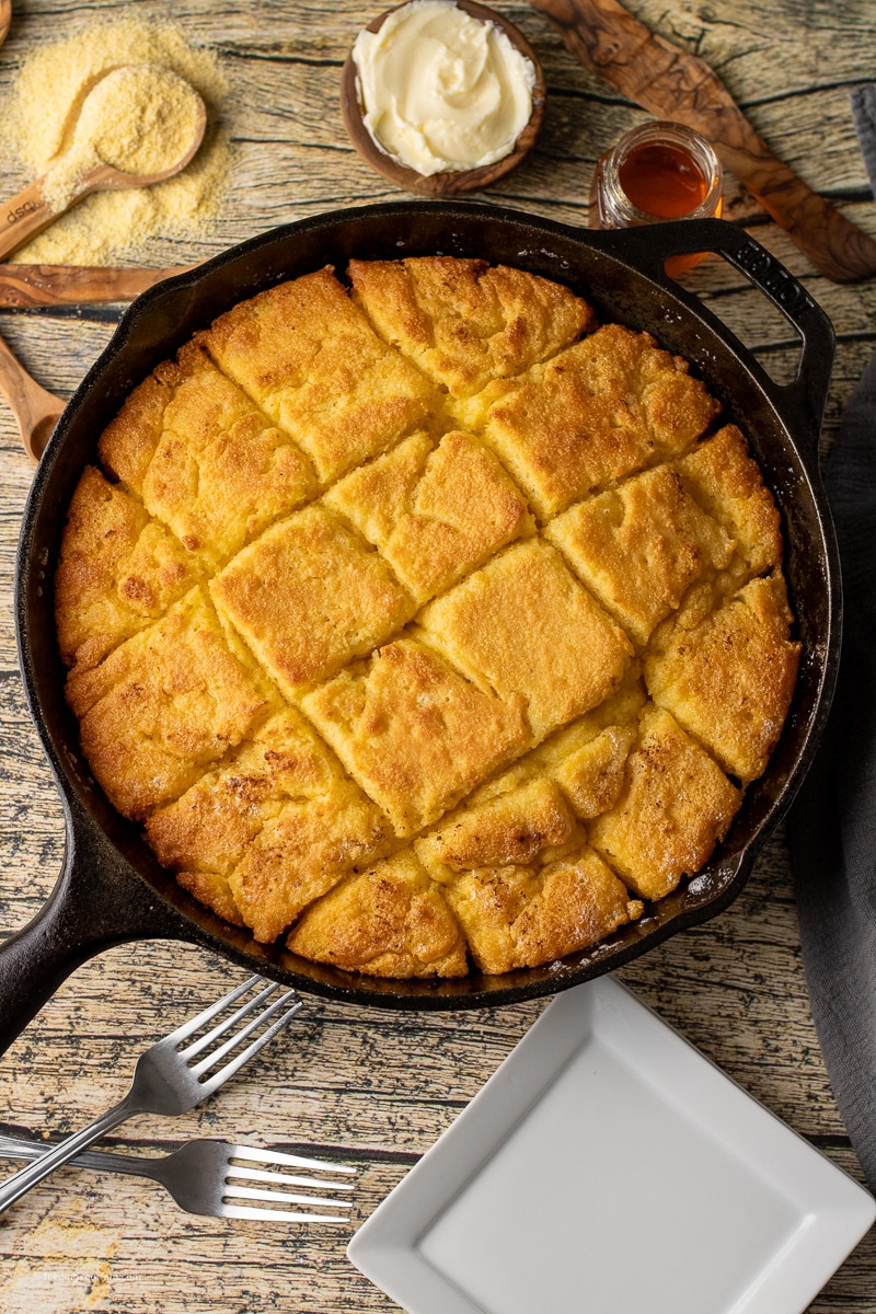 cornbread butter swim biscuits baked in a cast iron skillet
